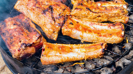 Assorted delicious grilled meat on a barbecue 