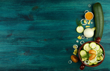 VEGETABLES ON BACKGROUND. FRESH VEGETABLES AND SPICES ON A WOODEN SURFACE. COPY SPACE