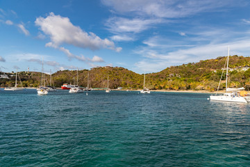 Fototapeta na wymiar Saint Vincent and the Grenadines, Britannia bay, sailboats, Mustique