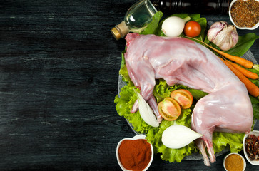 Fresh green zucchini on a dark table. The view from the top. Copy space.