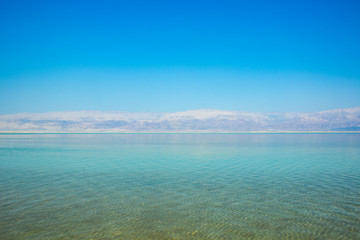 idyllic dead sea waterfront scenic landscape view health care resort destination holy place world famous heritage site wallpaper background photography with empty space for copy or text