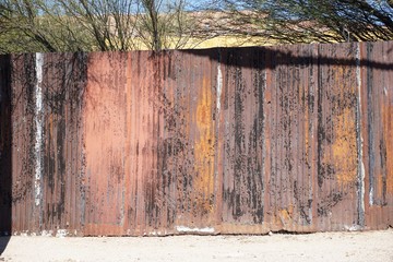Funky rusty corrugated metal barrier fence horizontal background texture