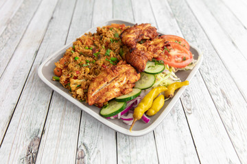 Grilled chicken with mixed vegetables and fried rice 