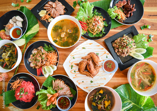 Thai Food Served On Dining Table Tradition Northeast Food Isaan Delicious On Plate With Fresh Vegetables Many Variety Various Thai Menu Asian Food On A Wooden Table Top View Wall Mural Engdao