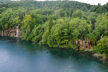 Beautiful Plitvice Lakes National Park in Croatia during the summer. Waterfalls and lakes complete this lush wonderland.