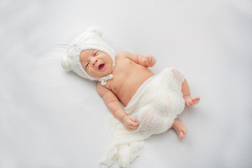 Close up of Asian newborn baby on white background
