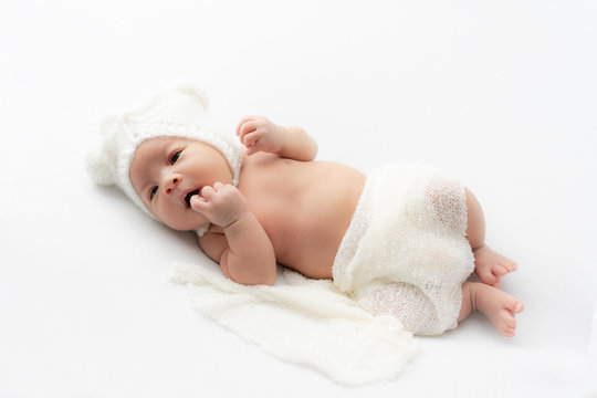 Close up of Asian newborn baby on white background