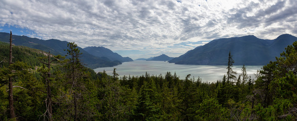 Beautiful Panoramic Canadian Landscape View during a cloudy summer day. Taken in Murrin Park near Squamish, North of Vancouver, BC, Canada.