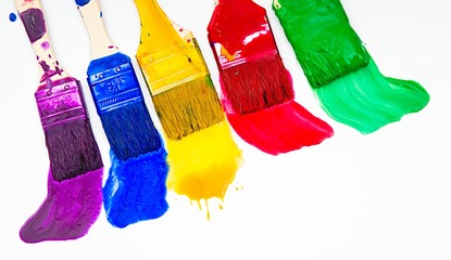 Brushes choosing colors to  paint walls 