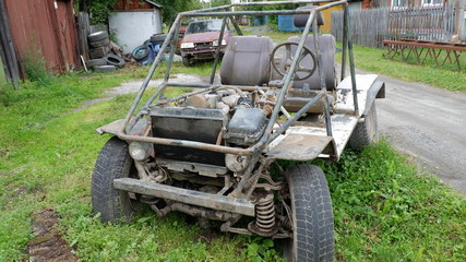 Obraz premium old tractor in field