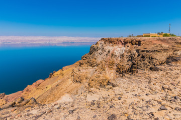 Fototapeta na wymiar View from the Zara trail, near the Panorama Dead Sea Complex in Jordan. Zara Cliff Walk offers stunning views of the Dead Sea coast.