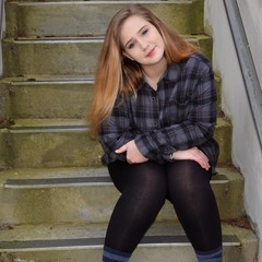 Girl waiting on steps