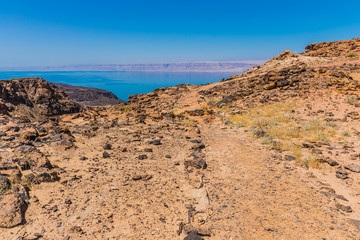 View from the Zara trail, near the Panorama Dead Sea Complex in Jordan. Zara Cliff Walk offers stunning views of the Dead Sea coast.