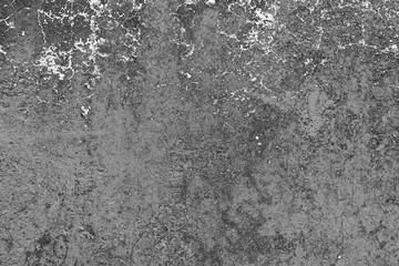 Texture of a concrete wall with cracks and scratches which can be used as a background