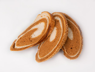 Freshly baked tasty bread on a white background