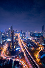 night vertically cityscape of bangkok amazing view of taksin bridge