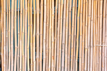 A background of faux bamboo sticks