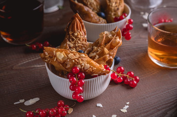Brushwood - russian traditional cookies with almond and berries