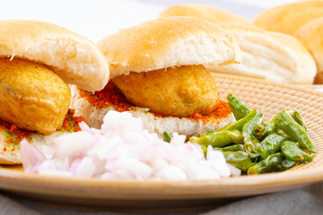 Indian Famous Street Food Vada Pav Also Know as Vada Paav, Wada Pav or Wada Pao is a Vegetarian Fast Food Dish From Maharashtra