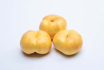 Three peaches in white background