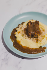 vegan sausages with sauerkraut potato mash and vegan gravy