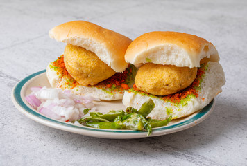 Indian Famous Street Food Vada Pav Also Know as Vada Paav, Wada Pav or Wada Pao is a Vegetarian Fast Food Dish From Maharashtra