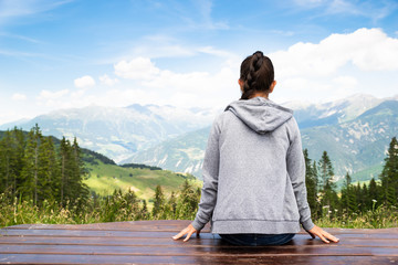 Woman Enjoying Panoramic Mountain View