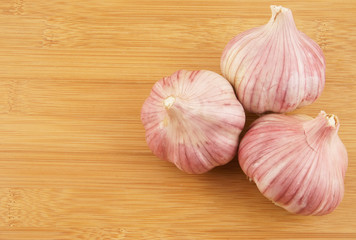 Garlic on wooden background