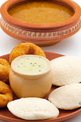 South Indian Popular Breakfast Idli Vada Served With Sambar And Coconut Chutney Also Know as Vadai, Vade, Idly or Medu Vada
