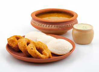 South Indian Popular Breakfast Idli Vada Served With Sambar And Coconut Chutney Also Know as Vadai, Vade, Idly or Medu Vada