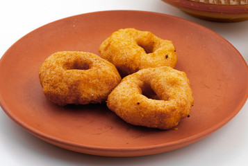 South Indian Popular Breakfast Vada Served With Sambar And Coconut Chutney Also Know as Vadai, Vade or Medu Vada