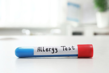 Fototapeta premium Tube with label ALLERGY TEST on white table