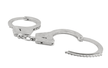 Obraz premium Steel metallic handcuffs isolated on white background