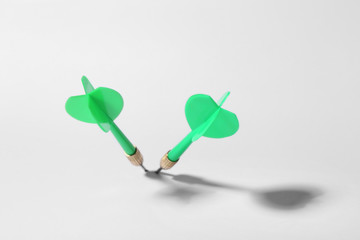 Green dart arrows for game on white background, above view