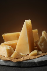 Fototapeta premium Marble board with delicious cheese on table