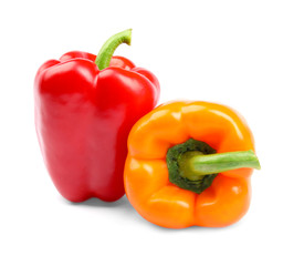 Fresh ripe bell peppers on white background
