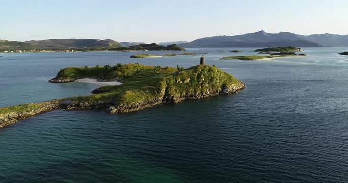 NORWAY, SOMMAROY - JULI 29, 2019 - Aerial footage of Vardholmen island in Sommar&oslash;y archipelago near town Tromso