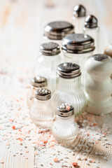 Closeup of salt in salt shaker with different salts
