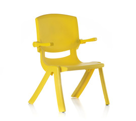 Children yellow plastic chair isolated on white background