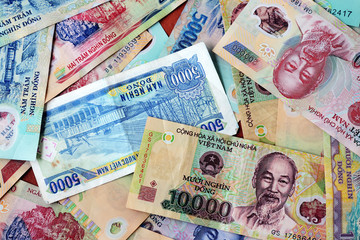 Various Vietnamese dong banknotes close-up. Money background