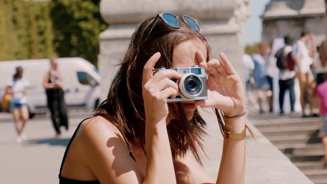 French woman takes pictures in Paris