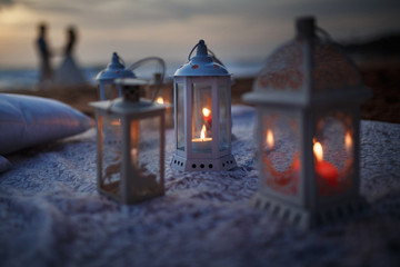 lantern on rhe beach, romantic mood