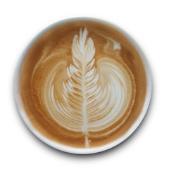 Top view of a mug of latte art coffee isolted on white background.