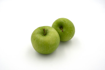 Fresh green apples isolated on white background. Top view.
