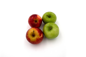 Fresh juicy group of red and green apples isolated on white background. Top view.