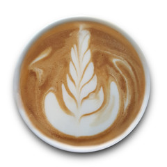 Top view of a mug of latte art coffee isolted on white background.