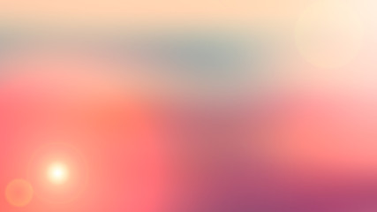Abstract blurred background and light flash of light. Pink, yellow and orange spot.