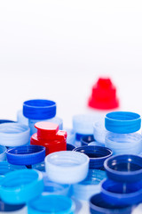 Plastic caps on white background