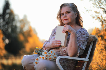 Adult woman in an autumn park