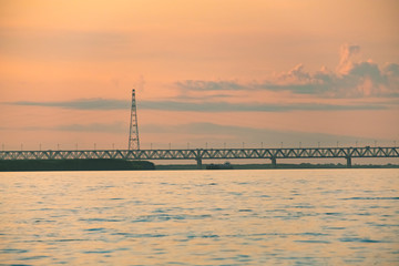 Fototapeta na wymiar View of the Amur bridge in Khabarovsk during sunset. Russia, Far East.